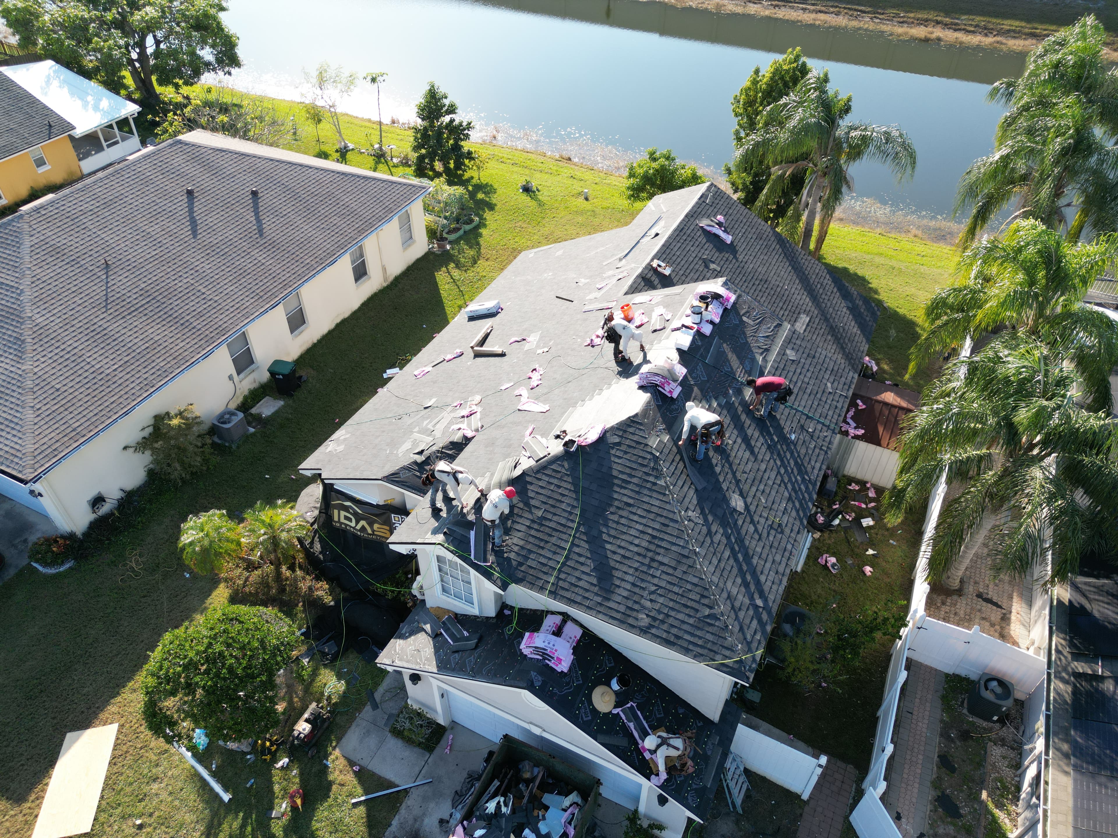 Aerial — neighborhood roofing project