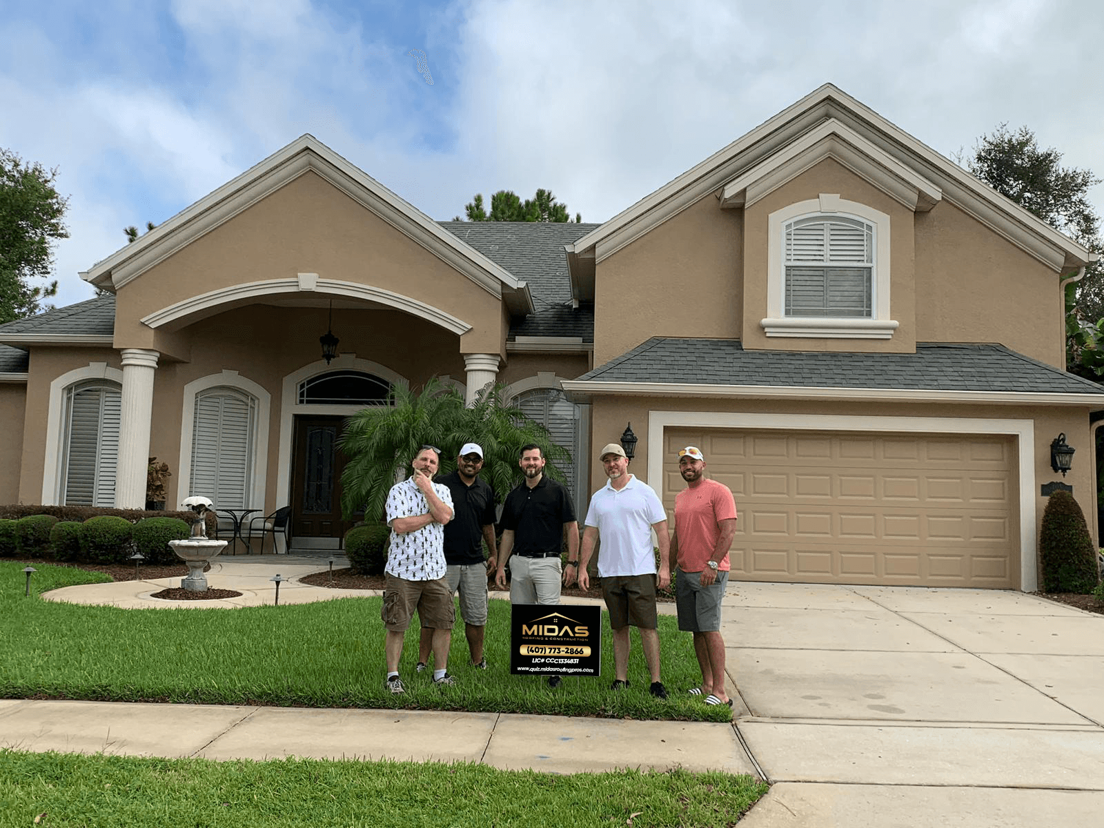 Midas Roofing crew on a residential project