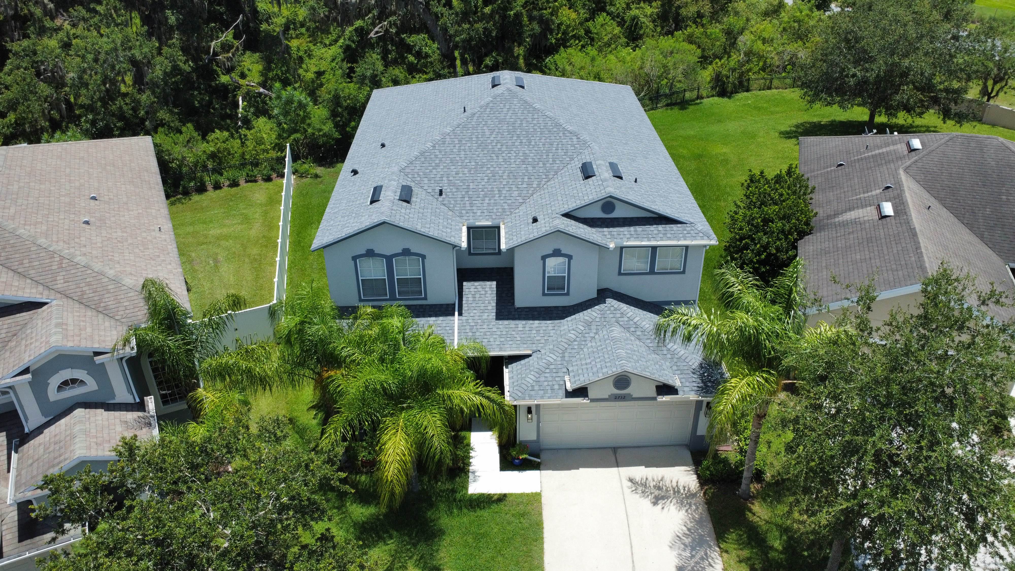 Aerial view of a completed shingle roof by Midas Roofing